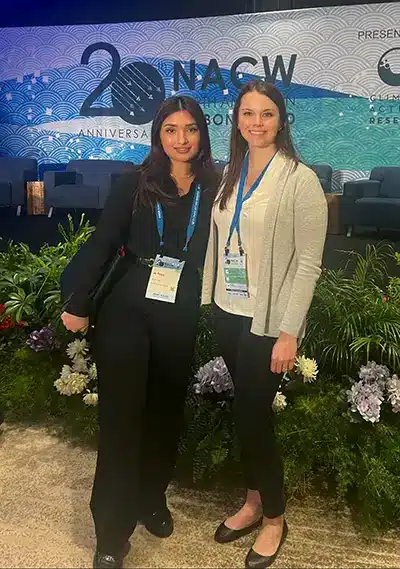 Haley Armstrong and Jo Thapa pictured at a conference